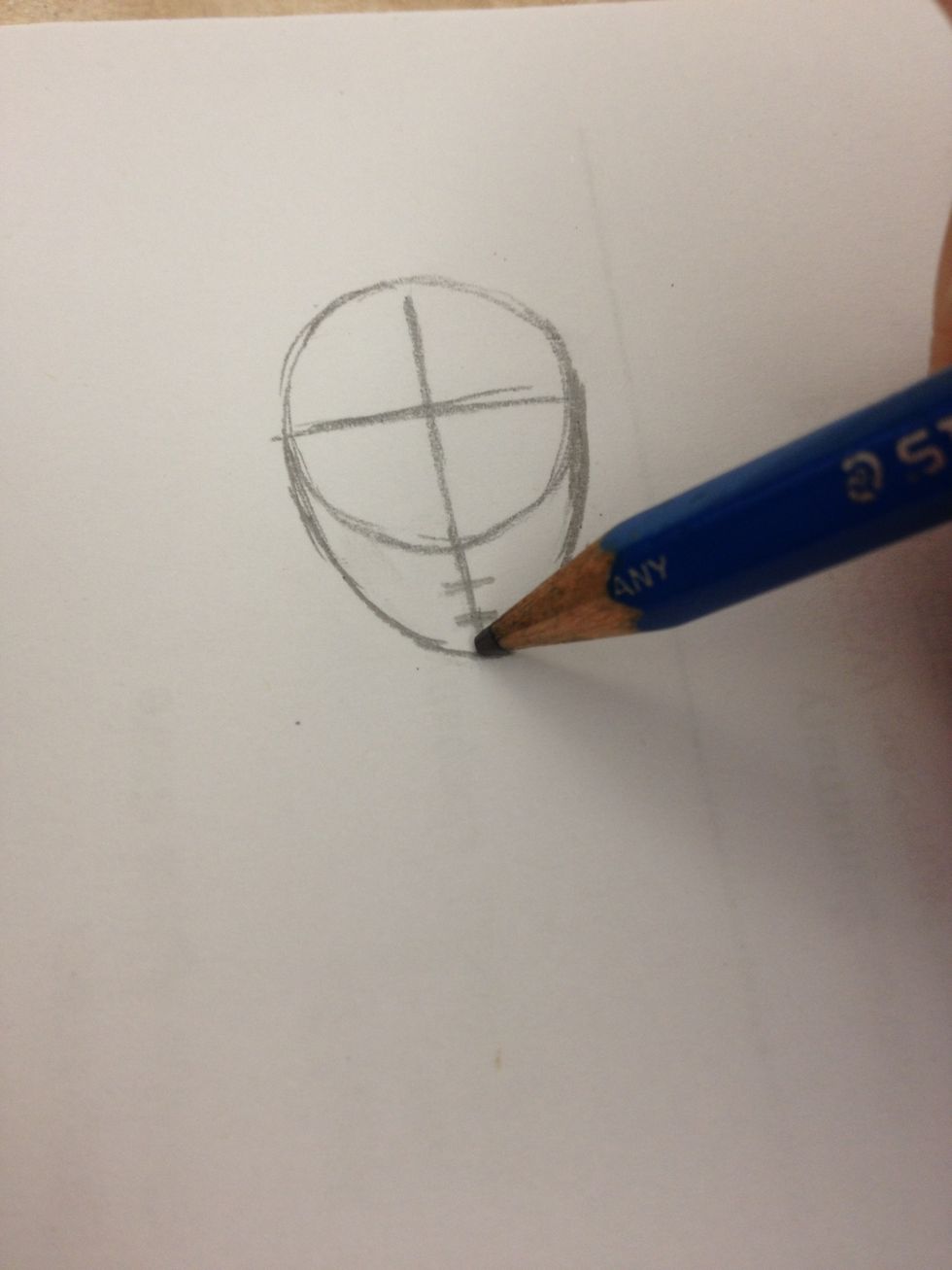 Connect the sides of the circle to the third line to make the head