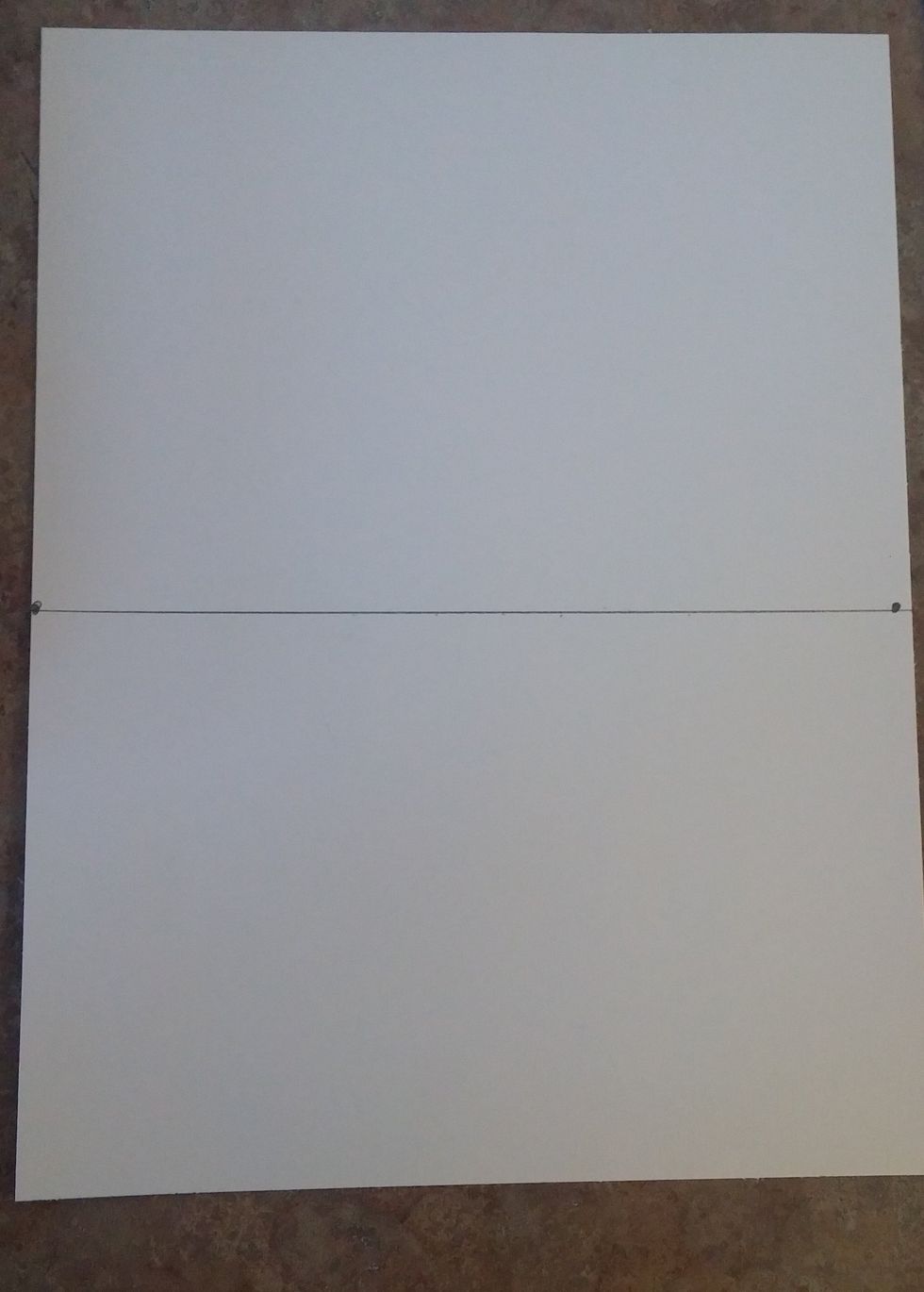 Connect the two dots previously made. This is the horizon line at 5 1/2 inches across the paper.