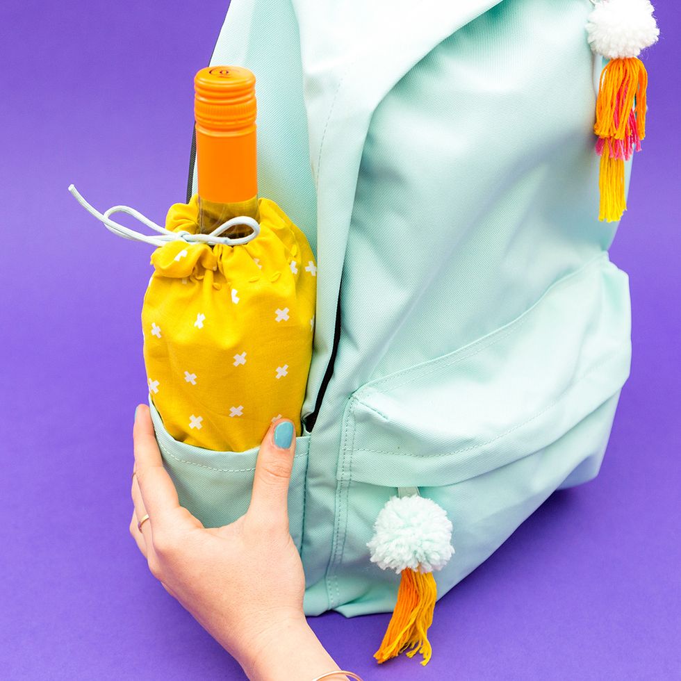 Connect the two pieces and you\u2019ve got yourself a perfectly handy wine carrier. The best part is the pouch adds a personalized pop of color to an otherwise ordinary backpack!