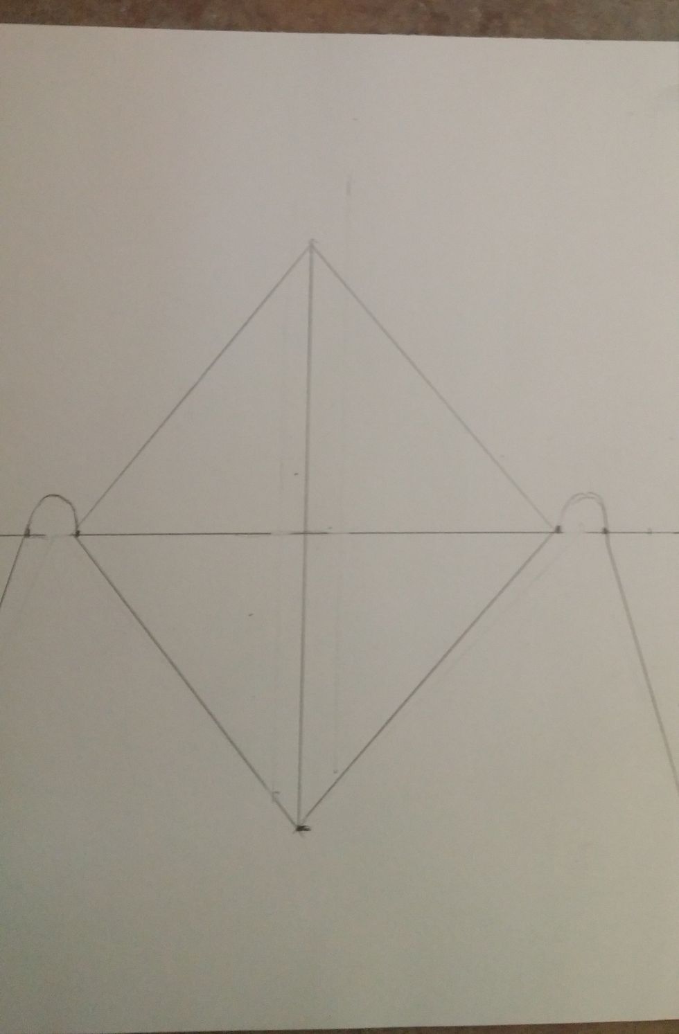 Connect the vanishing points to this center line. It creates a kite shape. This will help us place the trees correctly