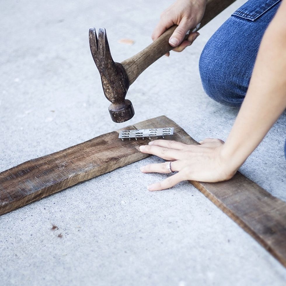 Connect the wood pieces by hammering a gang plate at each corner.