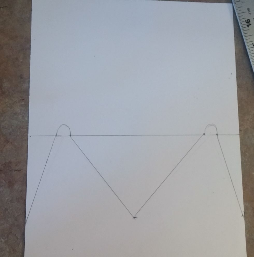 Connect this center dot to both vanishing points. The dot represents the part closest to us.