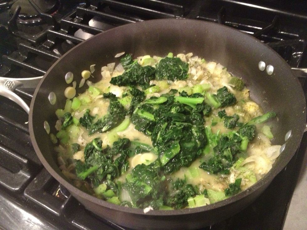 Continue adding broth to keep the mixture wet. Once the celery and onions are softened, then add the frozen green beans, and frozen kale. I used HALF A BAG of each today. (see video1)