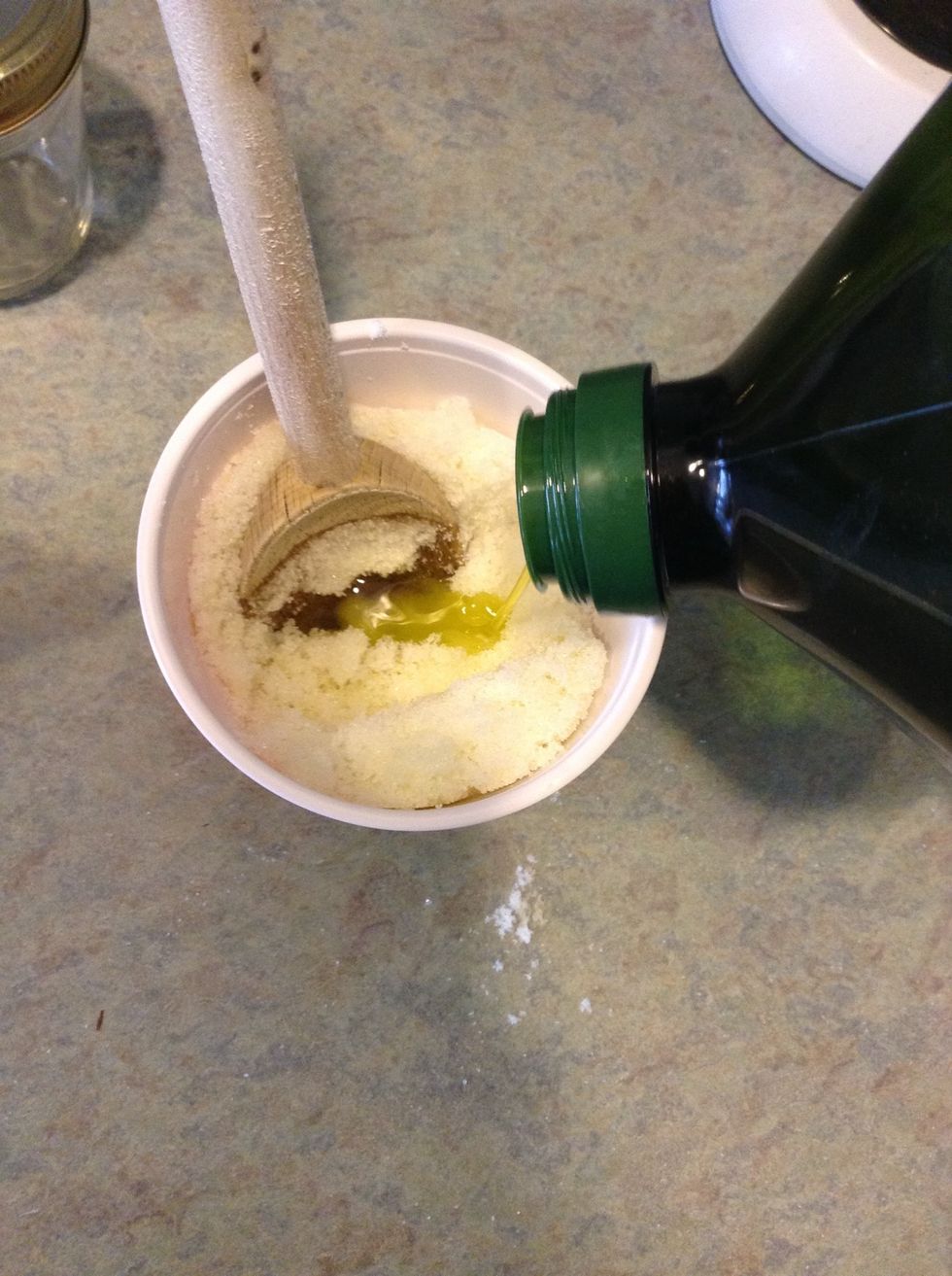 Continue adding olive oil as needed. The sugar should be a bit damp, but not wet. (It should be a little crumbly)