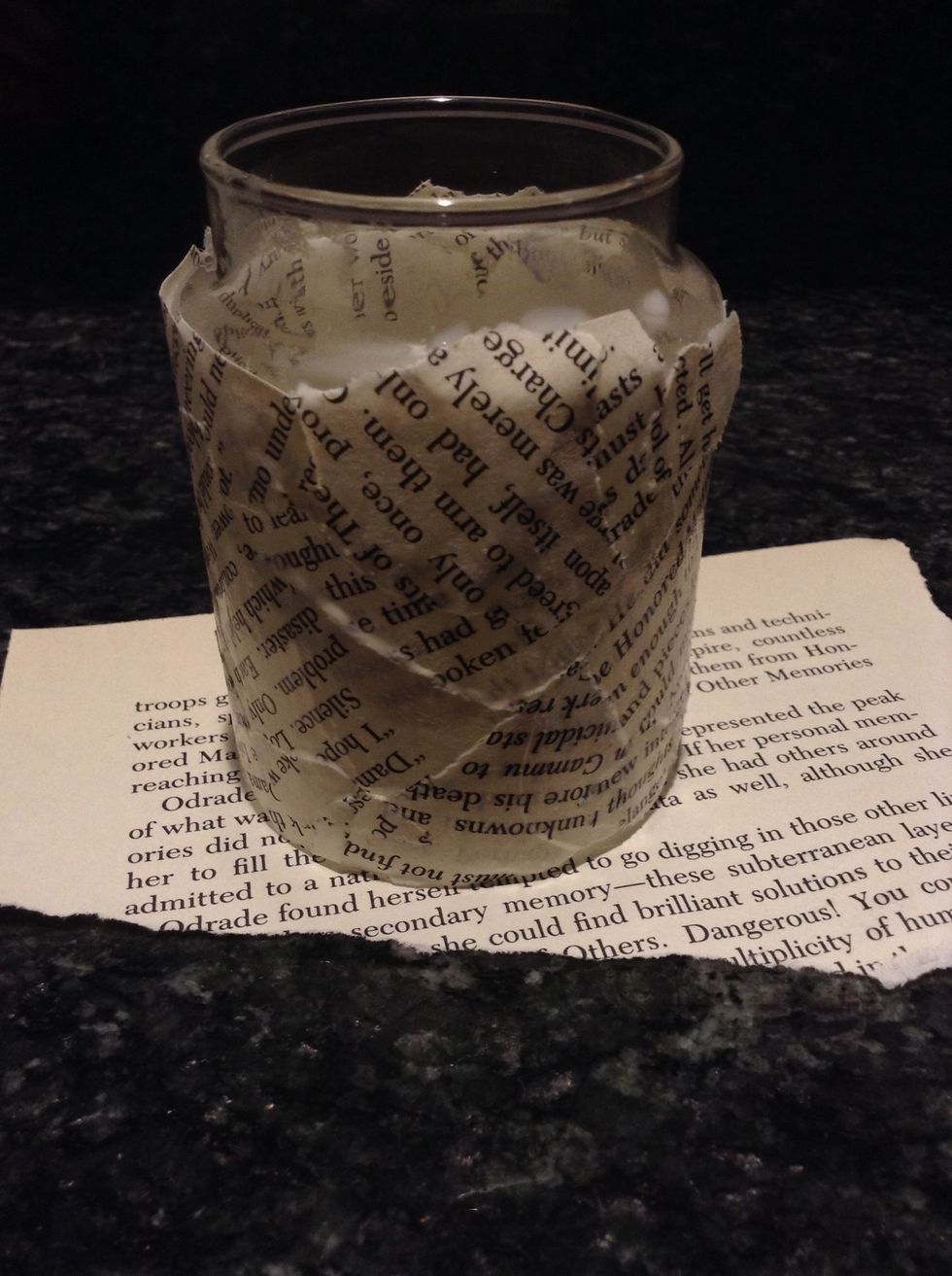 Continue around the jar and add Elmer's glue on top of the jar