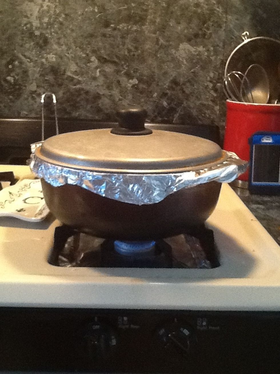 Continue by putting the cover. Lower the heat and let it cook slowly about 35-40 minutes.