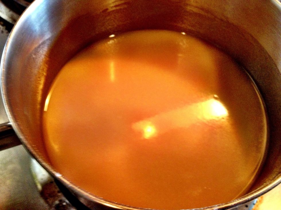 Continue cooking, whisking continuously, until roux turns a lovely dark caramel color. Note: if you've never done this before, you'll notice that the flour gets a bit stinky while it cooks.
