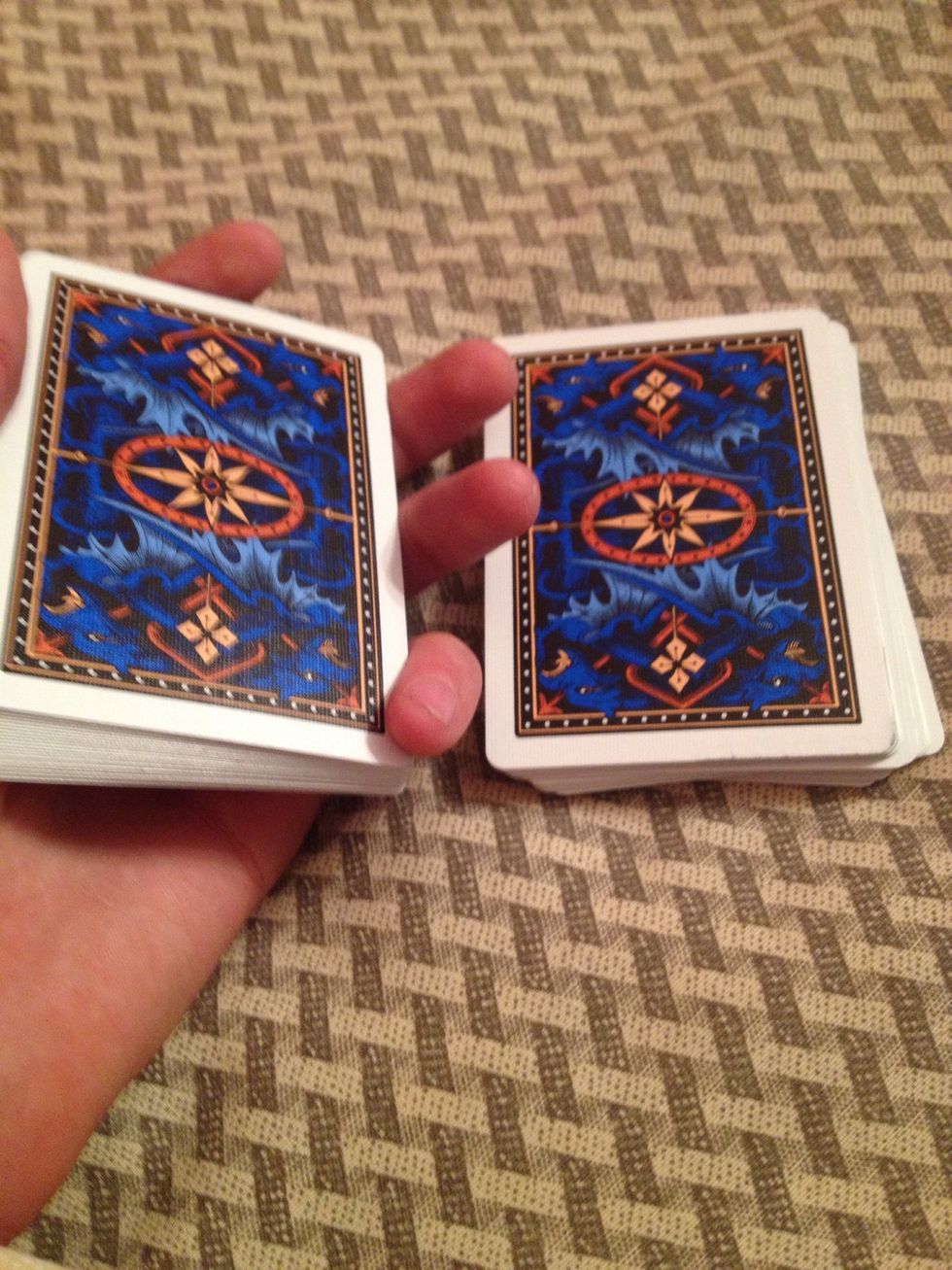 Continue cutting the cards until your pinky is on top.