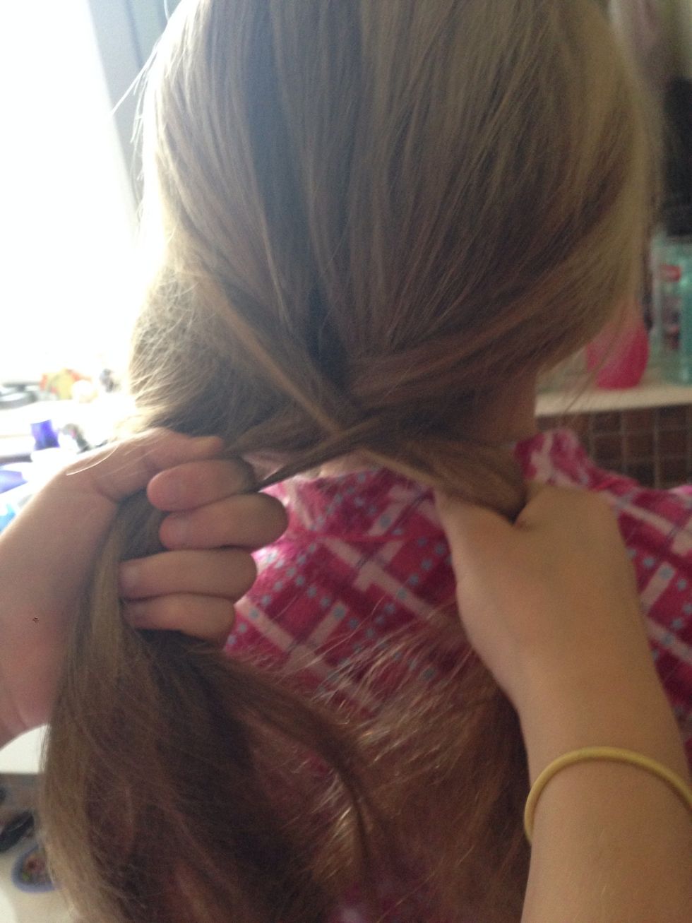 Continue doing the same steps over and over again until you reach the bottom of the hair.