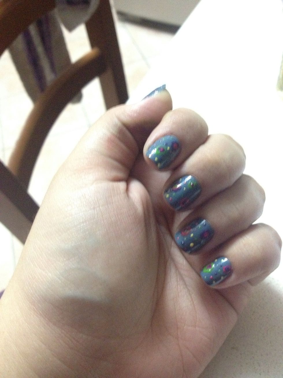 Continue doing this design on all your nails