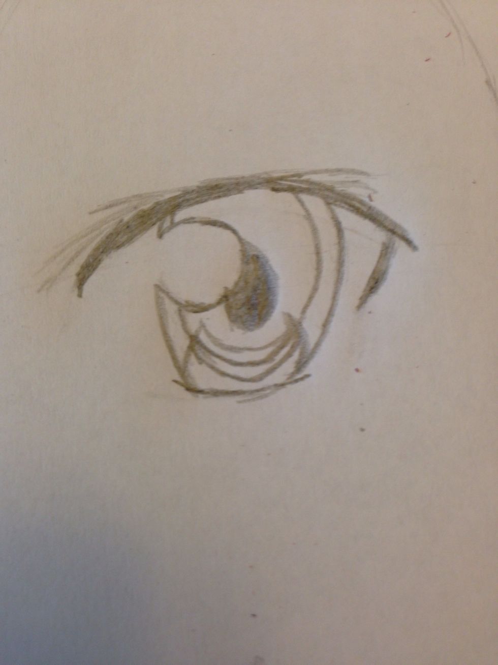 Continue drawing the lines you were drawing before to make a complete oval in his eye, Then draw another line so it looks like a skinny crescent like the picture above