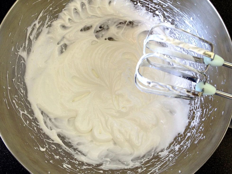 Continue in this way adding all the sugar 1-2tbsp at a time until it is all used up and your peaks are all stiff and shiny and stuff.