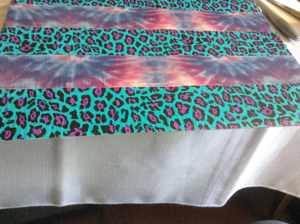 Continue in this way until your entire panel is covered. The last bit of tape will hang over.