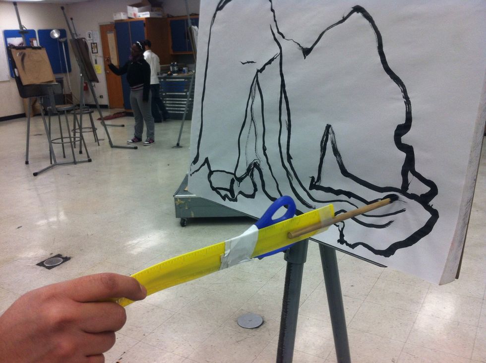 Continue loosening up with ink and a brush extended with a ruler. You should really feel loose now.