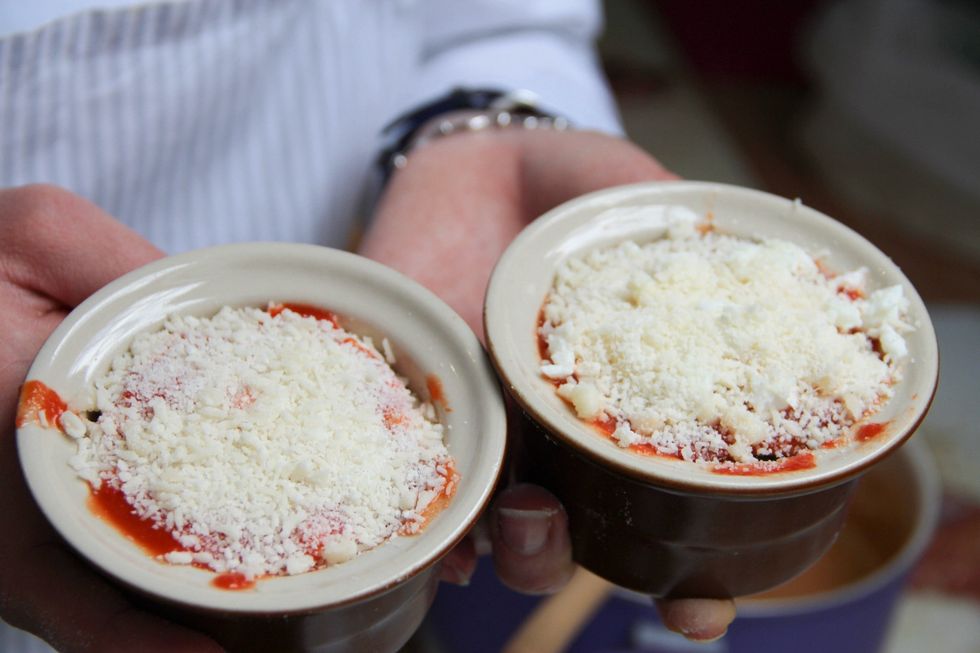 Continue making layers till you arrive to the top and sprinkle a last layer of parmesan cheese