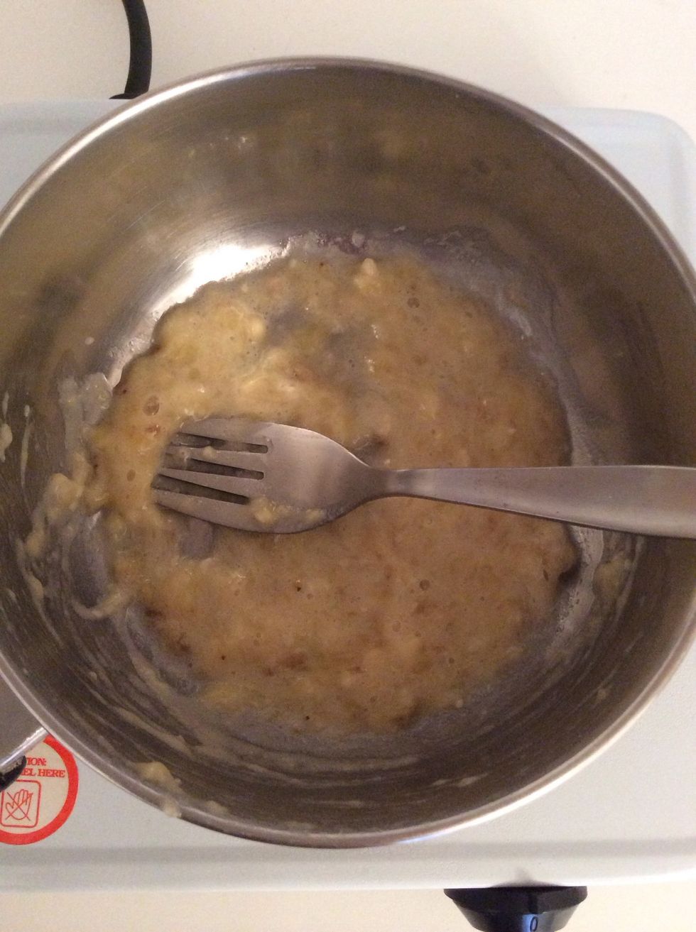 Continue mashing it until it's a more or less even consistency. Use the sides for help!