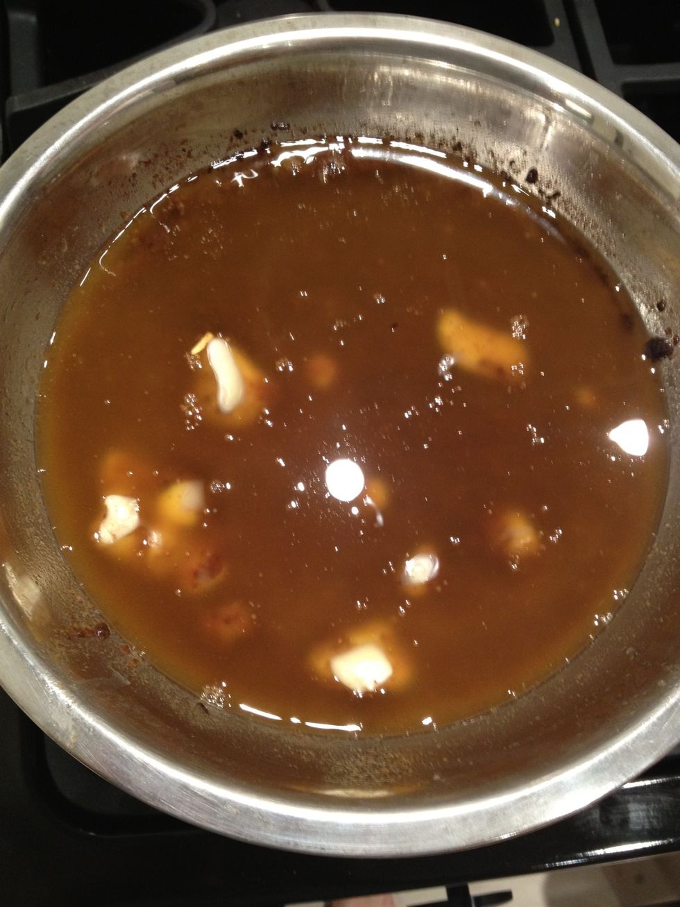 Continue melting it. The chunks will get smaller and smaller. You can turn up the burner, as long as the actual wax does not begin to boil.