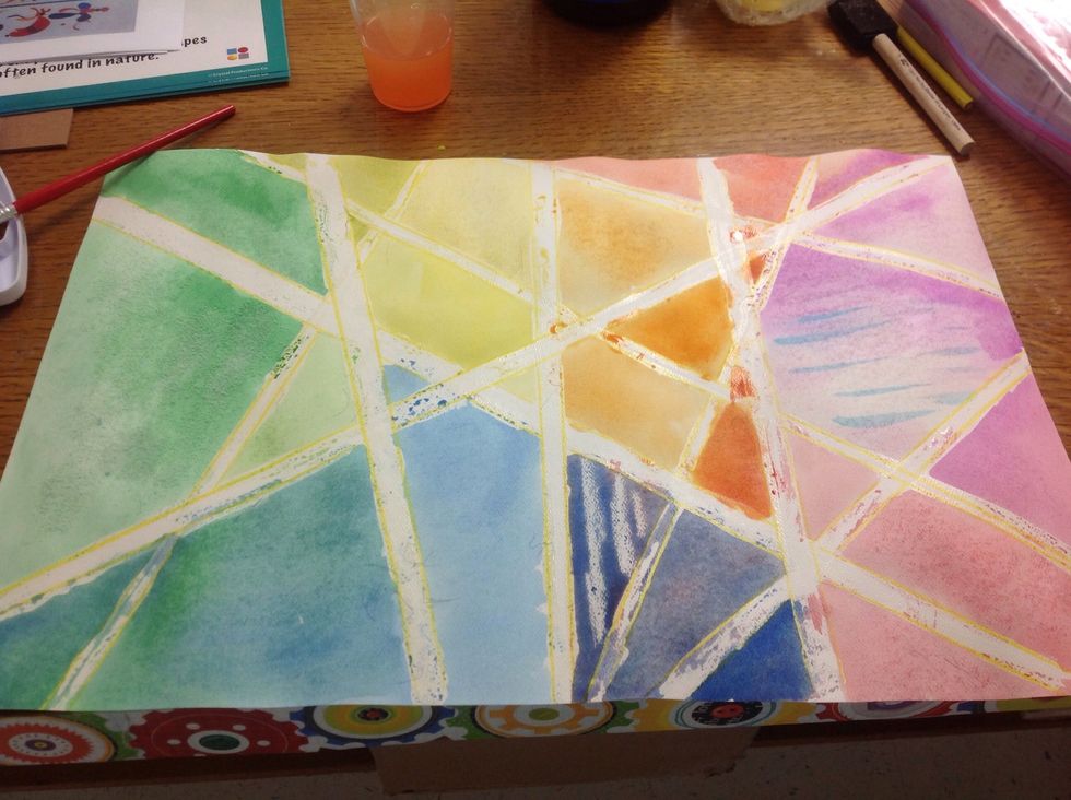 Continue painting the sections. Yes, my paintbrush is cheap and looses its bristles. No worries, they brush off when the paint and paper are dry.