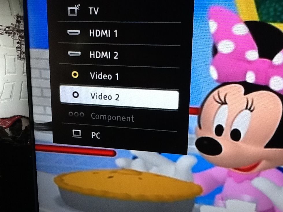 Continue pressing the Input button until "Video 2" is highlighted on the TV screen.