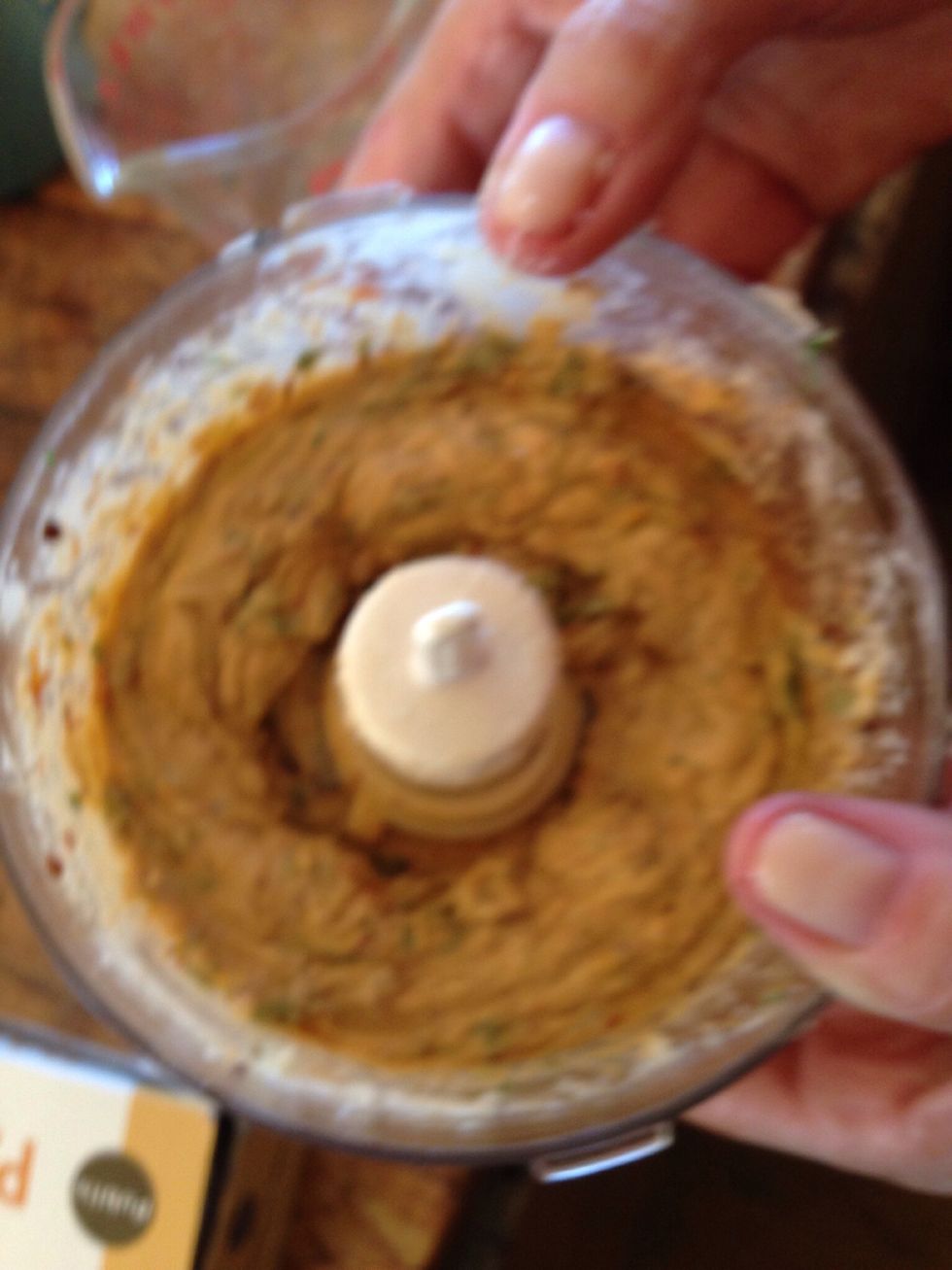 Continue processing just for about 30 seconds and scrape down the sides. Process again until a mostly smooth. A little olive oil can be added if too thick.