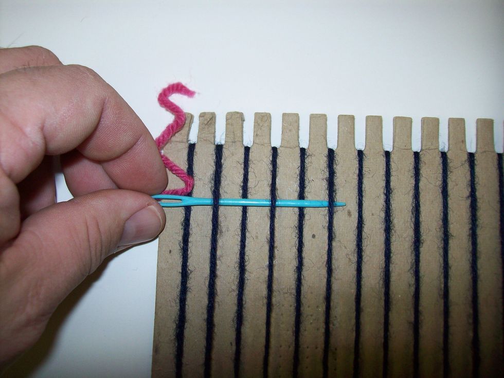 Continue pushing the needle OVER the even warps and UNDER the odd warps.