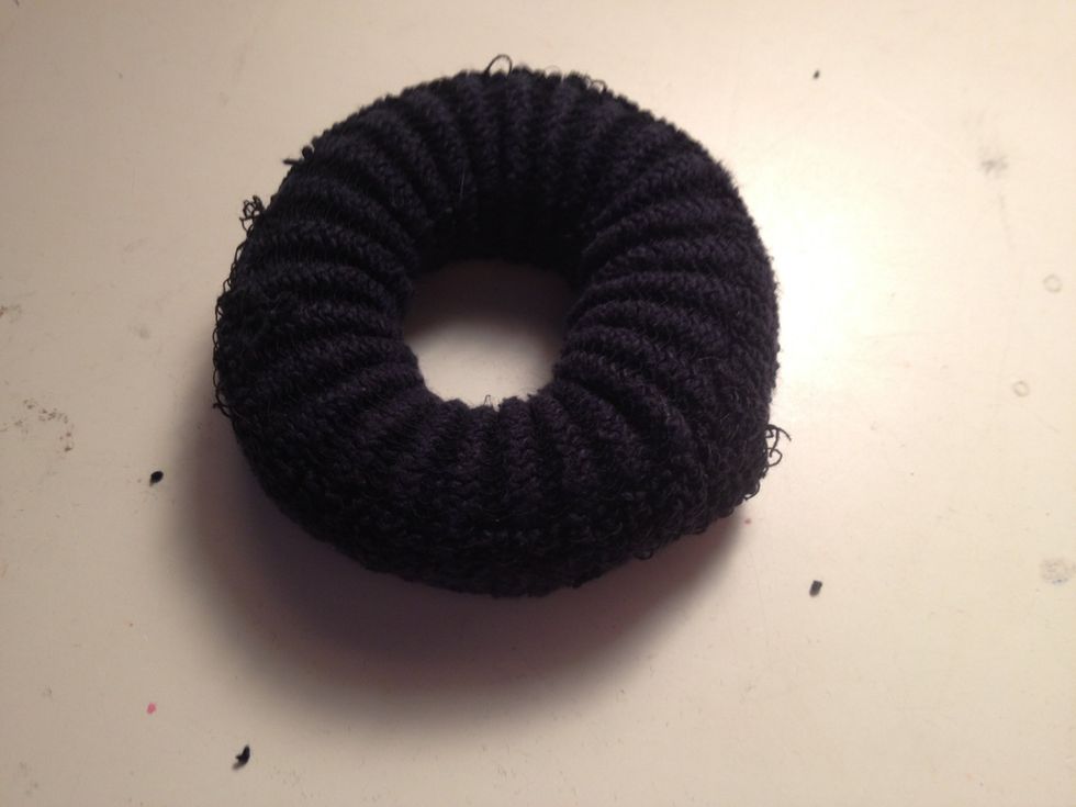 Continue rolling and you have your sock bun!