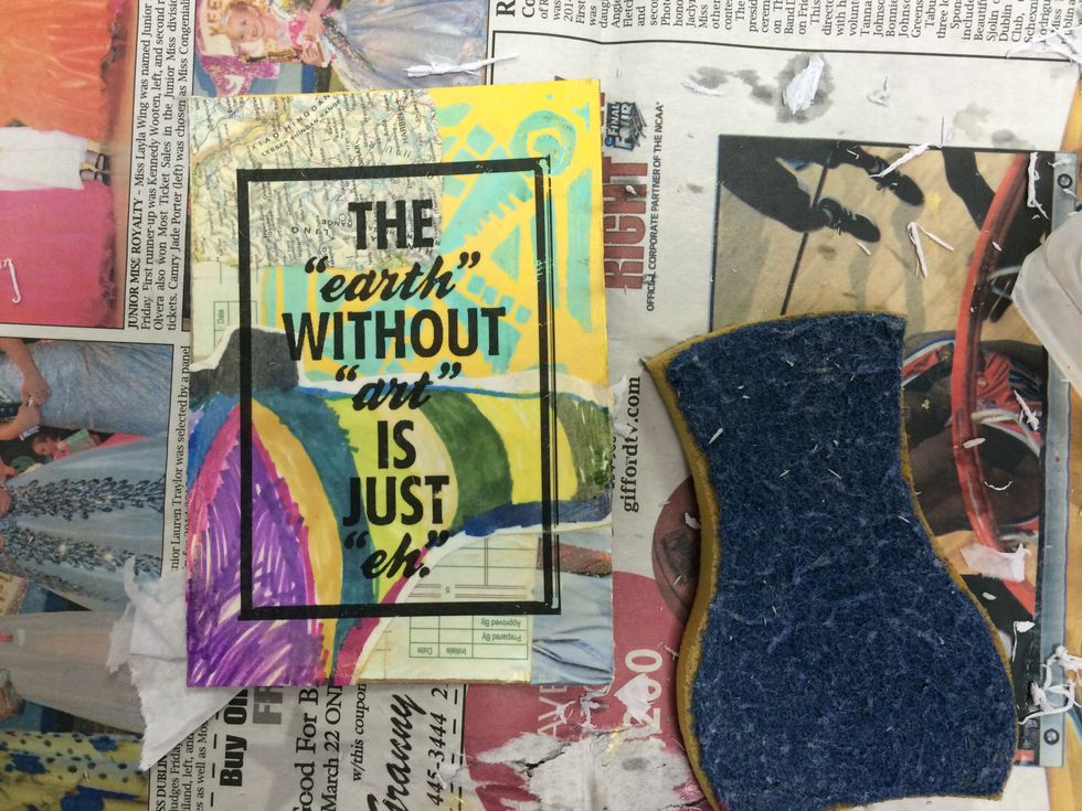 Continue rubbing with wet finger tips until all paper has peeled away and the image is clear.