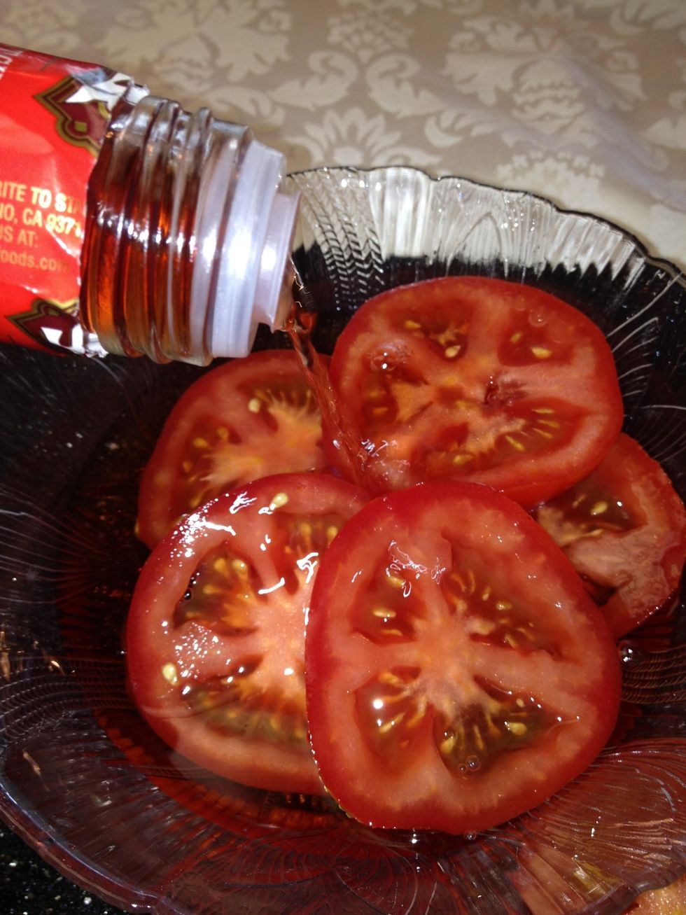 Continue slicing and marinade in a bowl with red wine vinegar and a drizzle of olive oil.