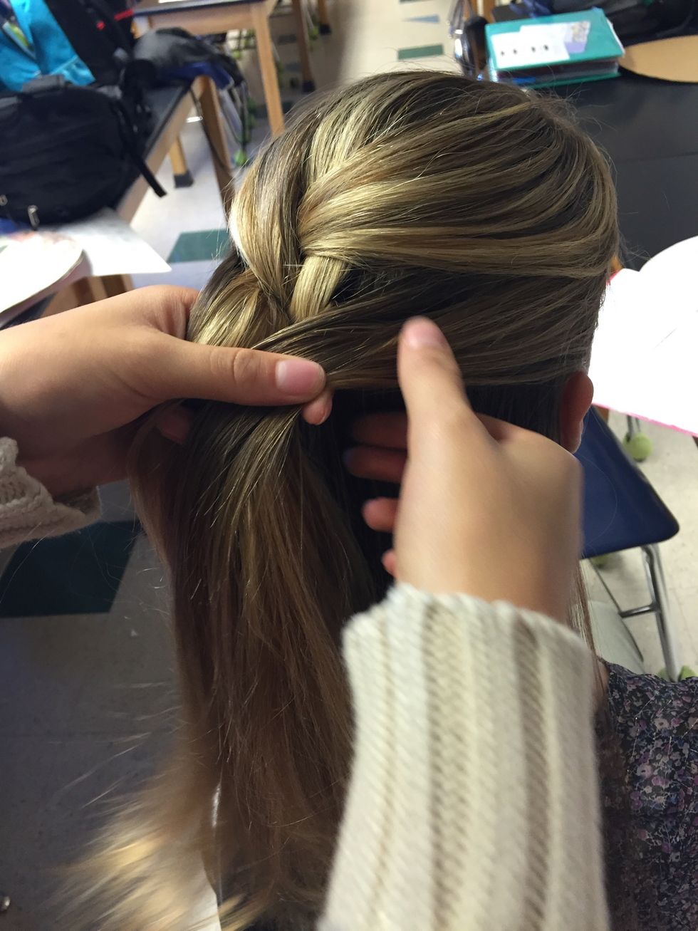 Continue step 5 until all of the hair has been added