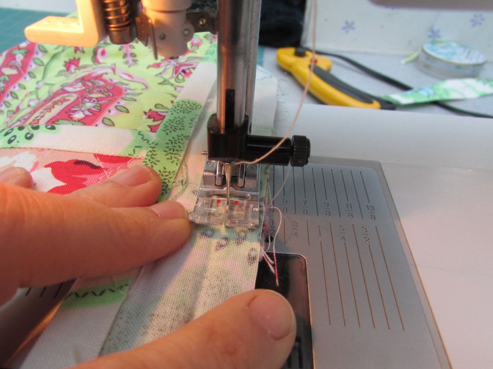 Continue stitching along the long side of your needle case, with the inside facing you.