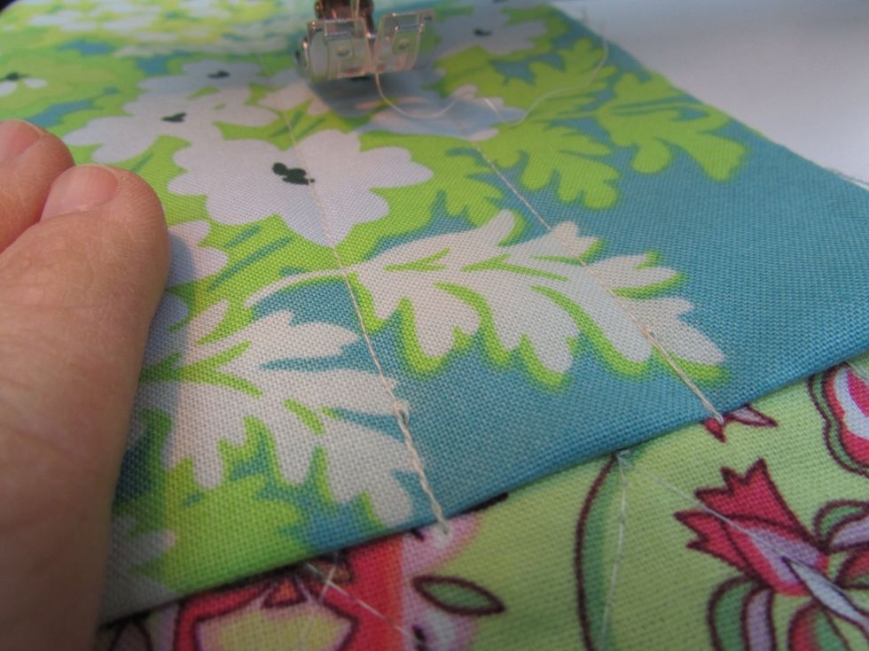 Continue stitching needle pockets, this time only 1" from the last. Continue until you have 10 pockets for your needles. If you have fatter knitting needles, you can always make these wider as needed.