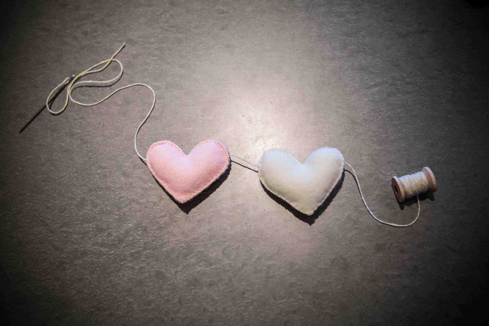 Continue stringing the hearts together.