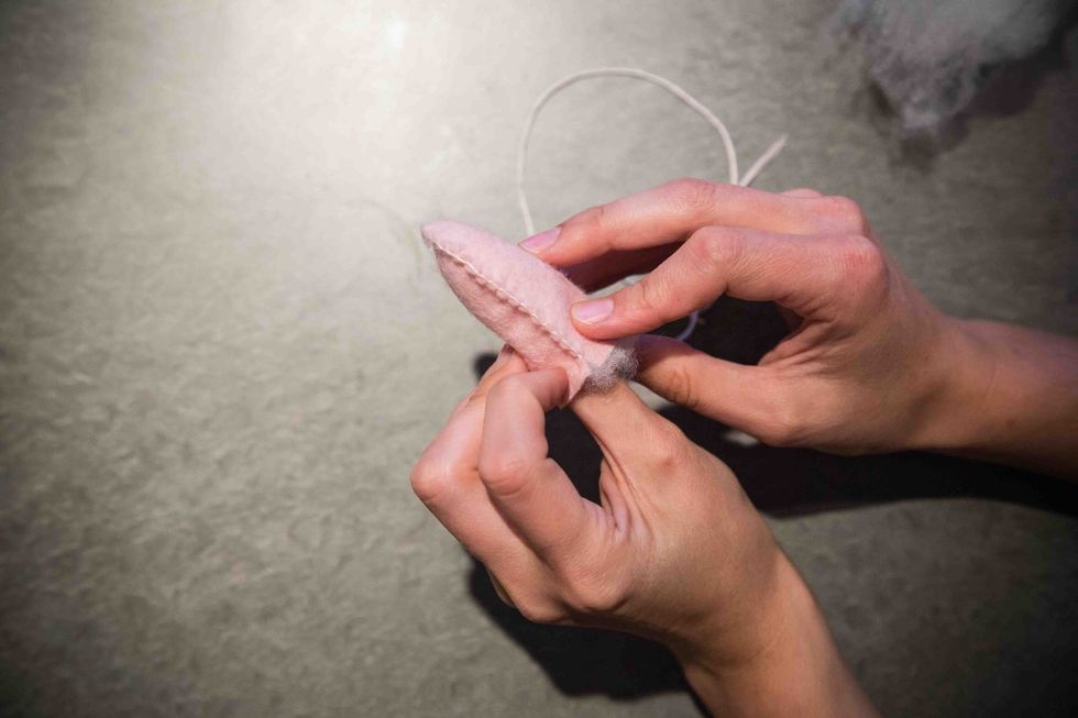 Continue stuffing until filled to your liking. Re-commence your blanket stitch until the heart is stitched all the way around and tie a knot to finish. Trim the embroidery floss as close as possible.