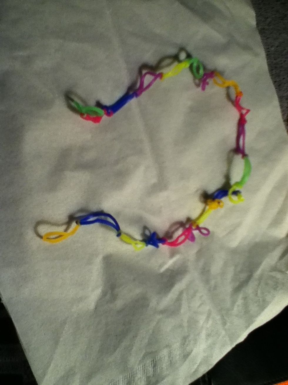 Continue that process until it has enough looms to fit your head.