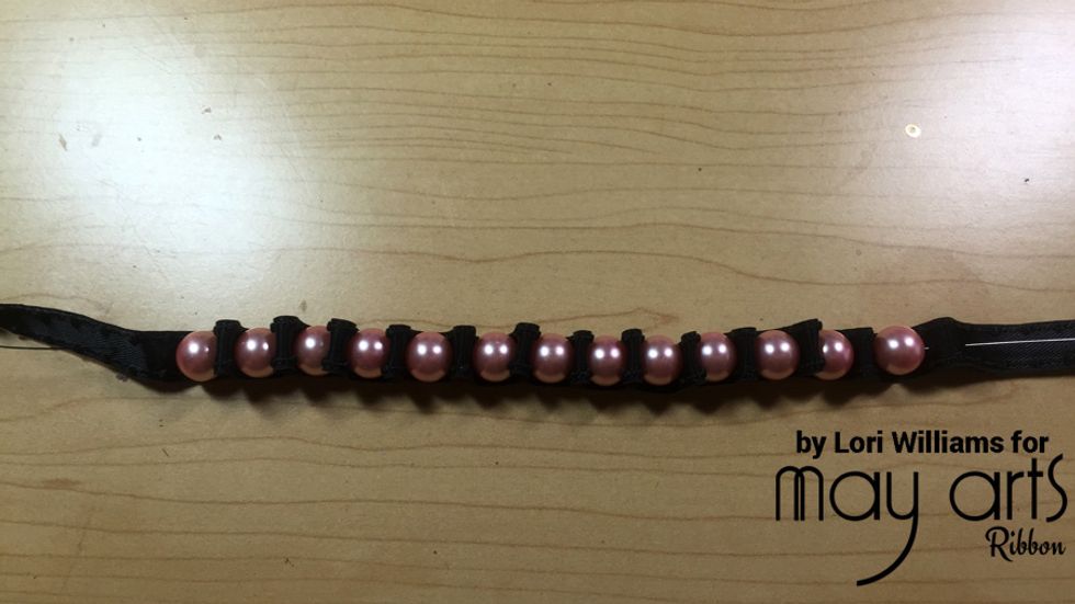 Continue the first step until you have enough of a length to go around your wrist. I used 13 beads, but this will varying depending on your size bead and size of bracelet desired.