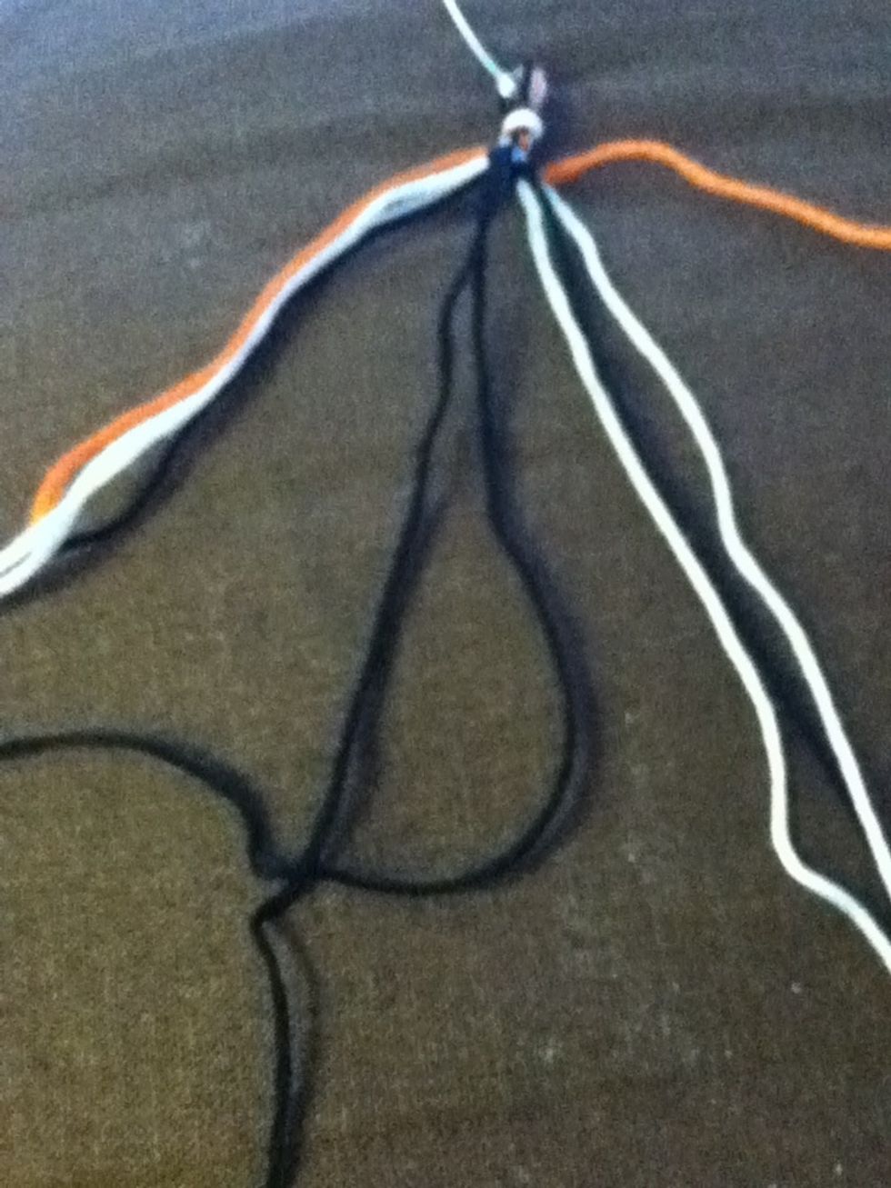 Continue the pattern to the left until you reach the center. The do the reverse -> reverse pattern over the other thread you brought to the center.