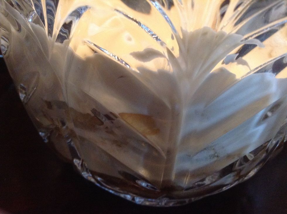 Continue the process of laying down the lady fingers and then putting the cream until satfisisfied