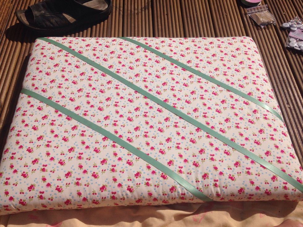 Continue this across the board. Do so across the ribbon to create a cross effect.