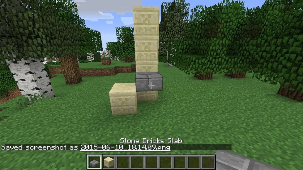 Continue this patter of block and slab until you reach the top of your creation.