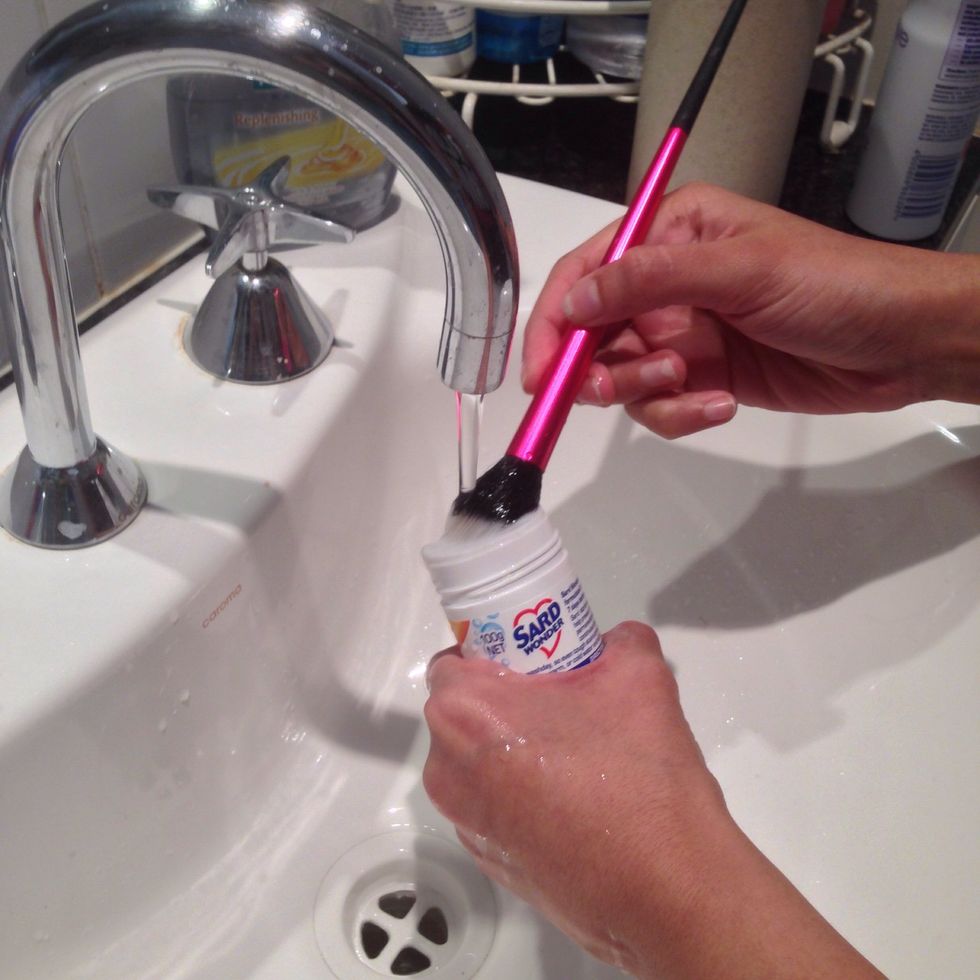 Continue this under warm running water until all color residue is gone and water runs clean