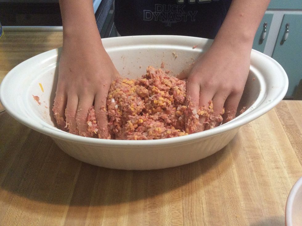 Continue to add in the biscuit mix, cheese, and onion until you run out.