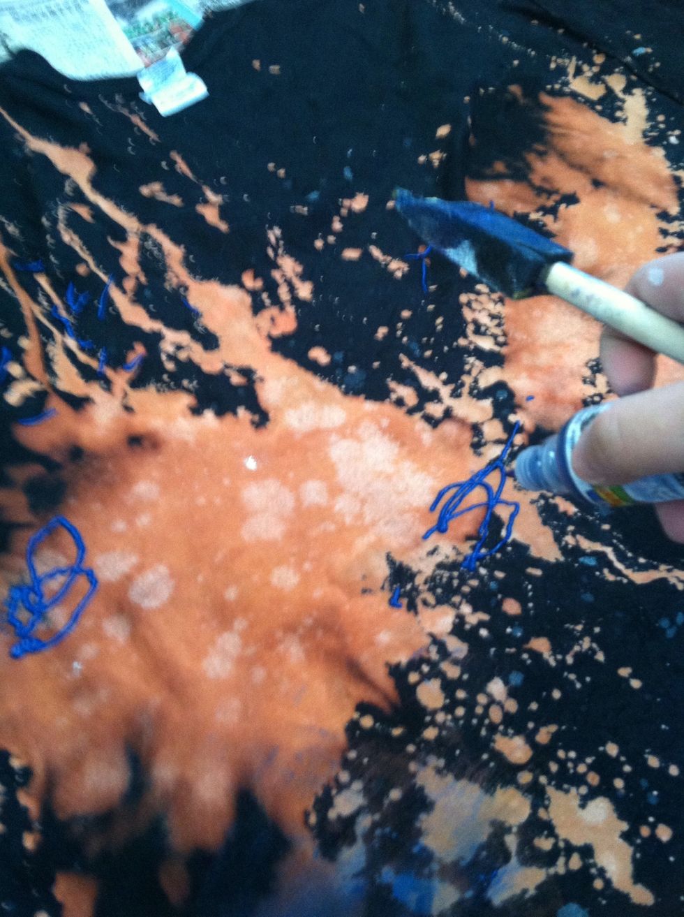 Continue to apply blue everywhere and anywhere you want! Hint: Put paint on galaxy edges.