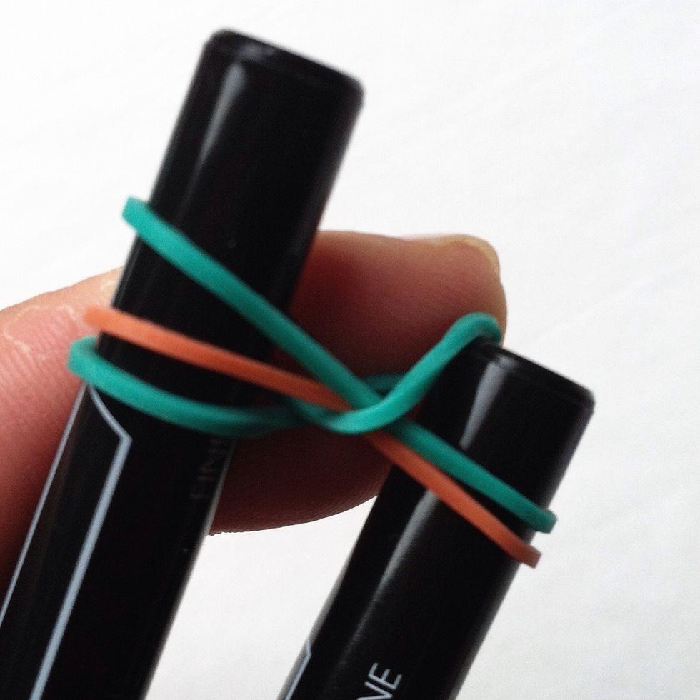 Continue to bring over the top and drop the elastic in the center.