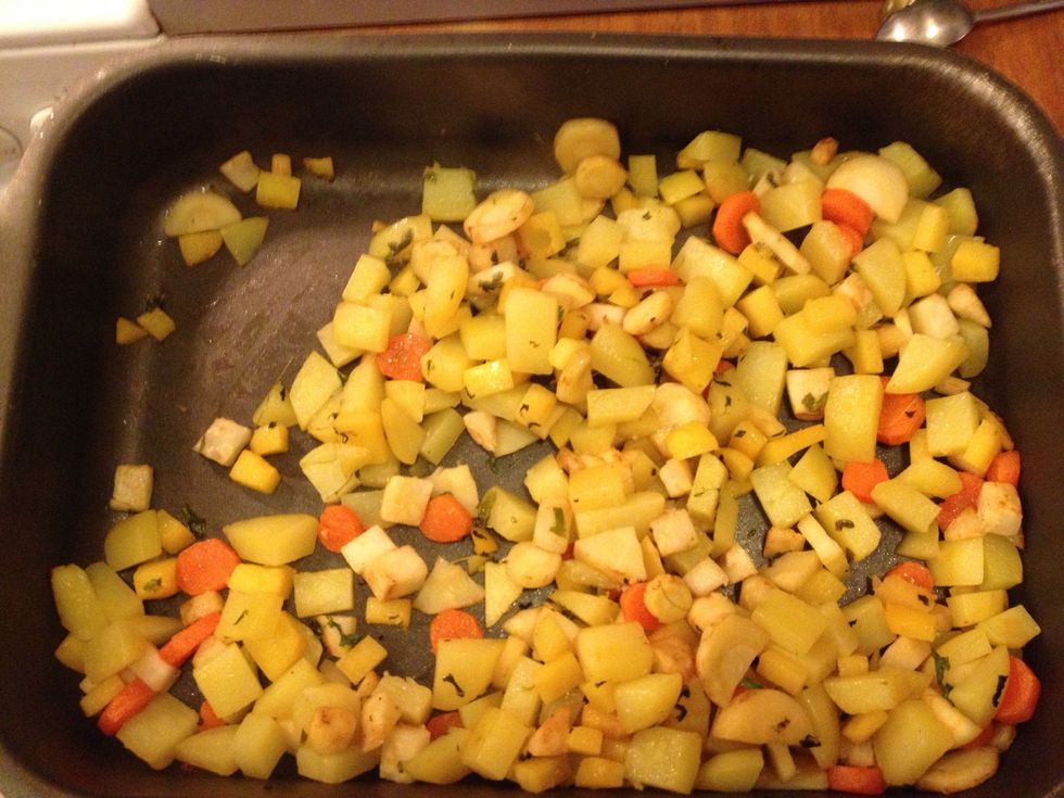 Continue to cook the veggies on a lower rack in the oven after the meat starts cooking.