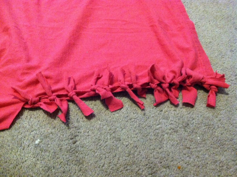 Continue to cut the slits and tie all up the side