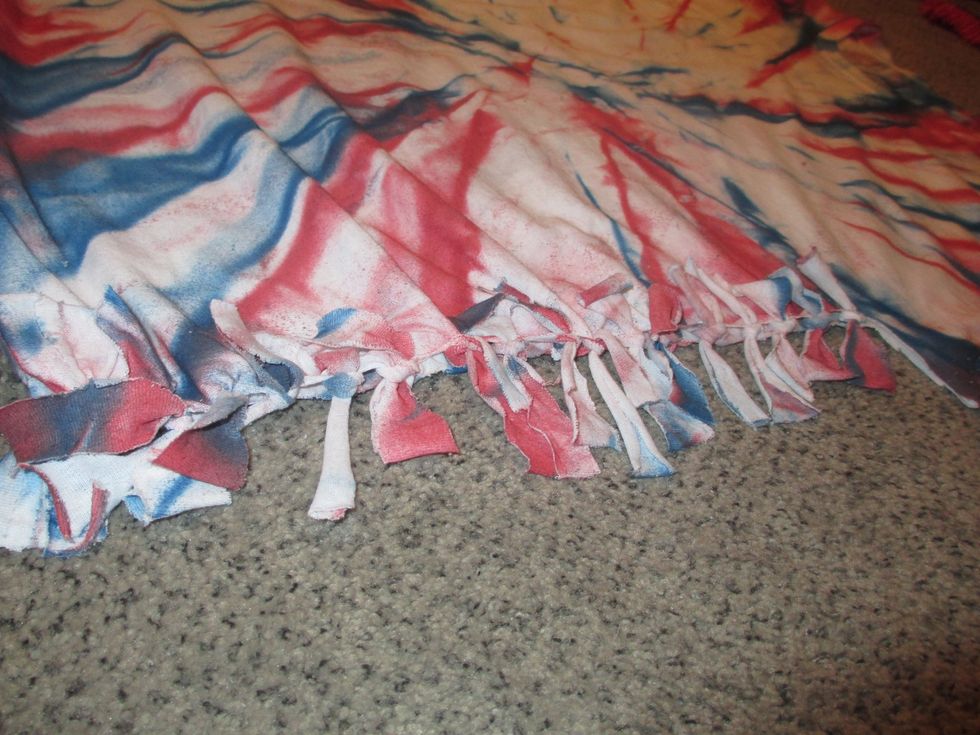 Continue to do this to all the tabs on both sides.