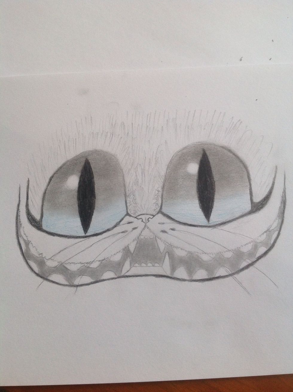 Continue to draw the fur on the head.