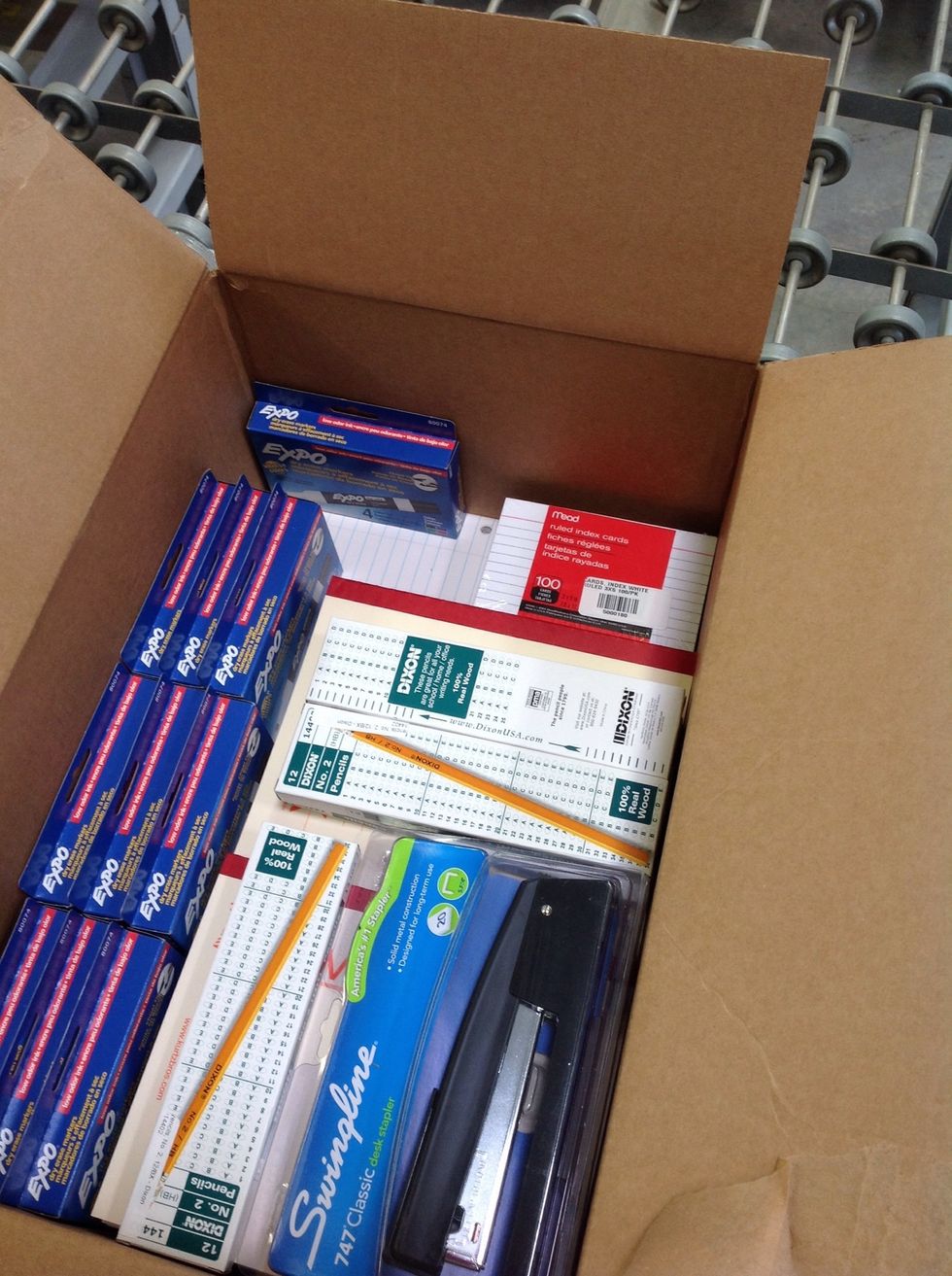 Continue to fill the box with the items.