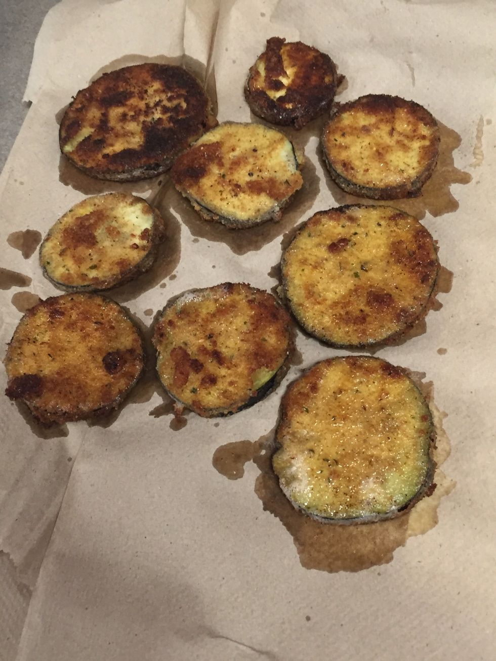 Continue to lay the eggplant on the paper towels