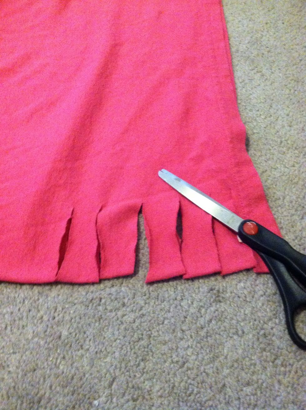 Continue to make slits up the side